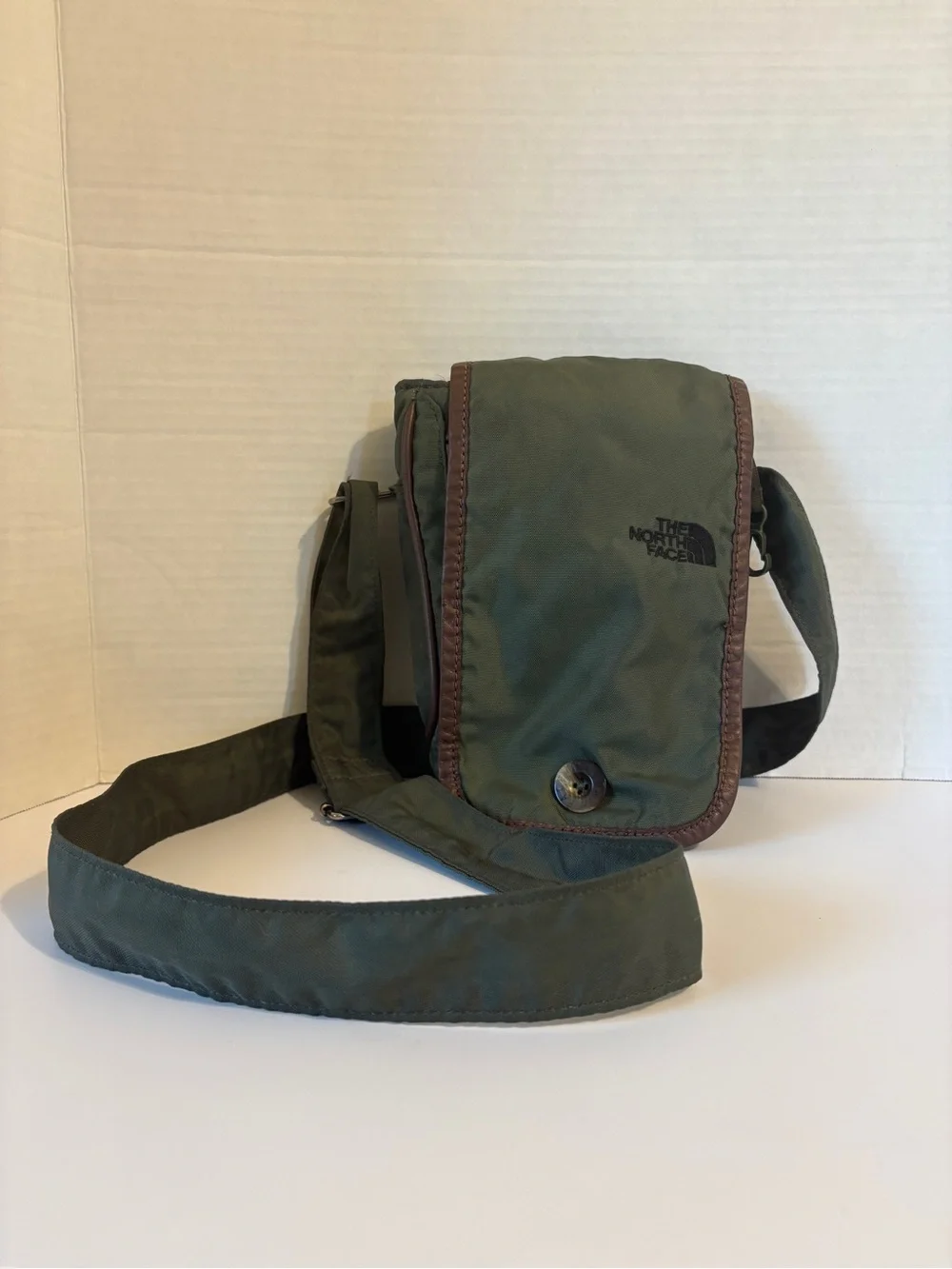 The North Face Olive Green Messenger Crossbody and Magnetic Buttons